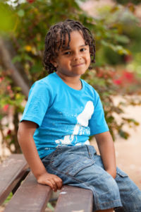 Young boy with braids